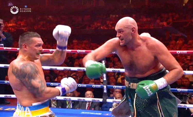 Pertarungan kelas berat paling mendebarkan, Usyk (kiri) versus Fury. (Foto: Tangkapan layar DAZN)